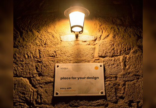 Sign under Old Light on Rock Wall Street Mockup