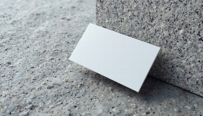 A Business Card Mockup Displayed On A Textured Background