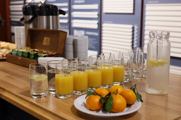 A delightful assortment of refreshing beverages and colorful fruits for a gathering event