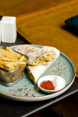 Lavash doner kebab. Durum kebab. Shawarma, wrap. Fries