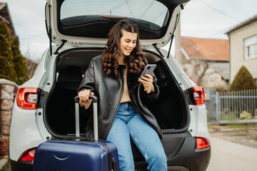 Young caucasian woman packing suitcase preparing for travel