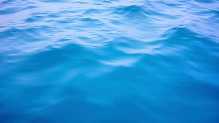 Naklejka premium Dynamic waves of the deep blue sea create a mesmerizing texture, motion, serene, texture