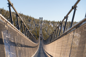 Sky Bridge 721, Lower Moravia, Czech Republic - December 1, 2024: The longest pedestrian suspension bridge in the world. Mountain resort Dolni Morava