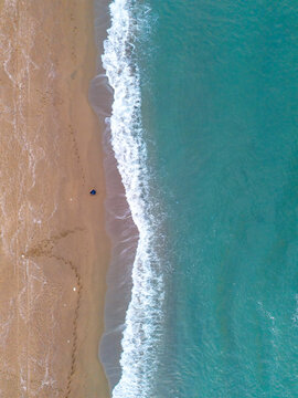 Sakarya Karasu High-angle view of a tranquil beach meeting turquoise waves. An aerial shot of a pristine beach meeting a turquoise ocean. ADAPAZARI Turkey Turkiye Aerial View Drone Shot nature 
