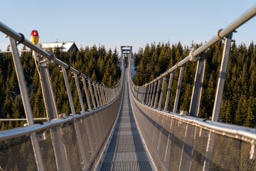 Sky Bridge 721, Lower Moravia, Czech Republic - December 1, 2024: The longest pedestrian suspension bridge in the world. Mountain resort Dolni Morava