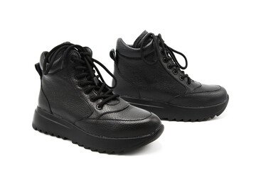 Fashionable leather lace-up sneakers isolated on white background. View from all sides. 