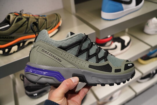 Paris france , 12 12 2024 : trendy sneakers shoes brand on display , Salomon