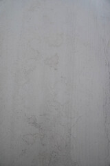Minimalist concrete wall texture with faint lines and smooth gray finish
