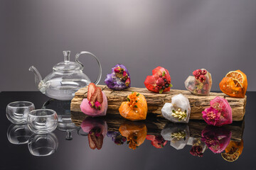 fruit berry tea in transparent balls and heart