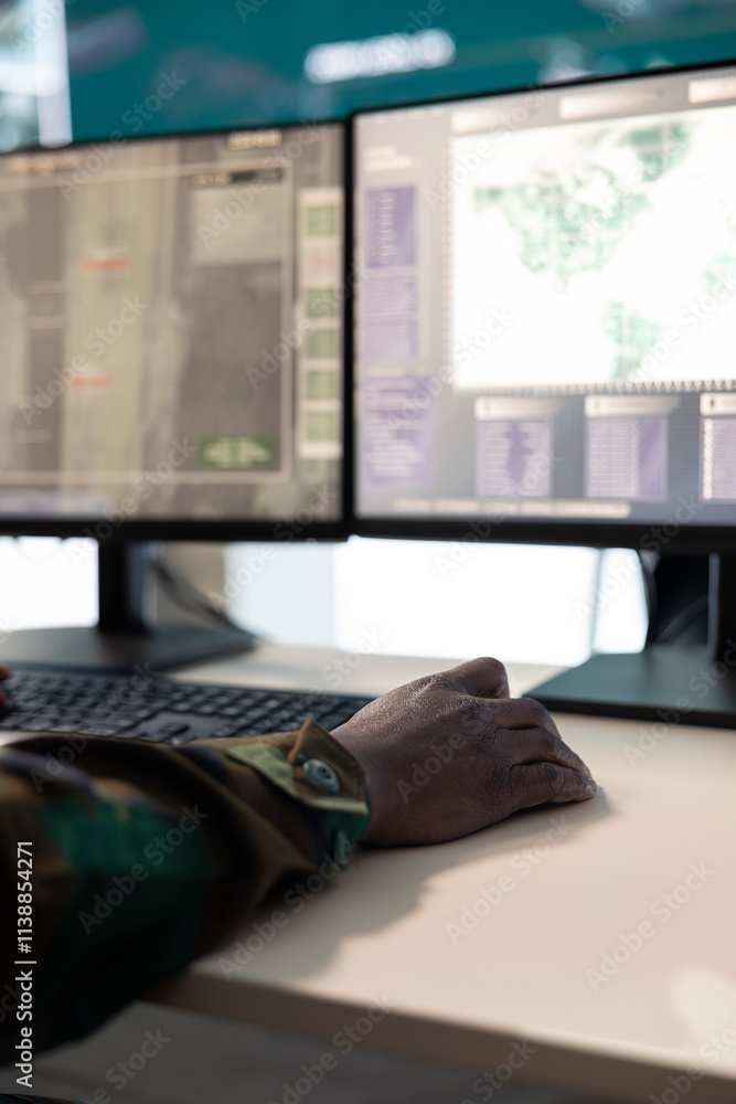 Aufkleber it operator working on reconnaissance activity mission to gather important data, supporting deployed