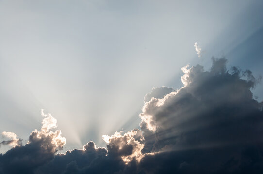 A Dramatic Cloud Formation Enhanced by Beautiful Sunlight Rays Illuminating the Sky