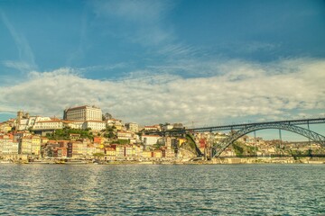 Naklejka premium Porto, Portugal. Panoramic cityscape image of Porto, Portugal with the famous Luis I Bridge and the Douro River 