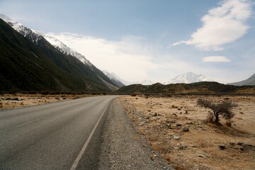 Scenic Road Leading to the Alps, Majestic Mountain Landscape