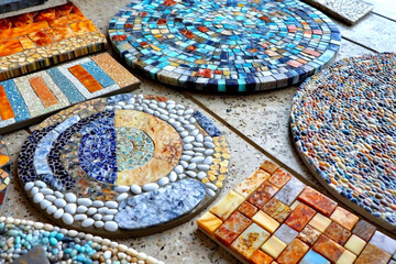  a diy pebble mosaic project featuring various handmade mosaics made from