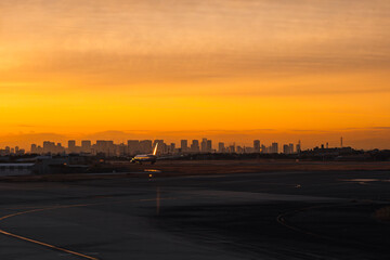 sunrise over the airport and city