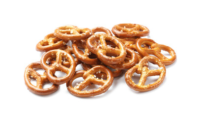 Many delicious pretzel crackers isolated on white