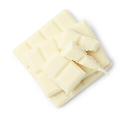 Pieces of delicious white chocolate isolated on white, top view