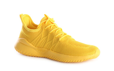 One stylish yellow sneaker isolated on white