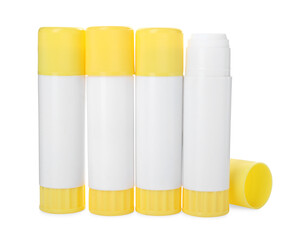 Many different glue sticks isolated on white