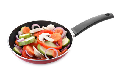 Frying pan with mix of fresh vegetables and mushrooms isolated on white
