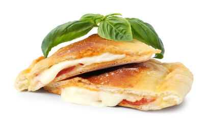 Pieces of delicious calzone pizza with mozzarella, tomatoes and basil isolated on white