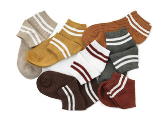 Pairs of soft socks isolated on white, top view