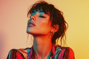 Fototapeta premium Stylish Portrait of a Woman with Colorful Lighting and Modern Fashion