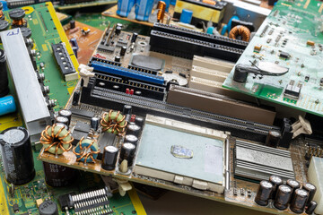 Obraz premium Collection of Discarded Circuit Boards and Computer Components