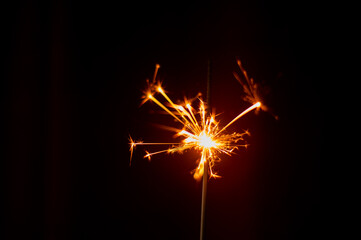 sparkler on dark background Happy New Year