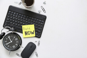 Composition with text RIGHT NOW, modern gadgets, alarm clock and stationery on light background