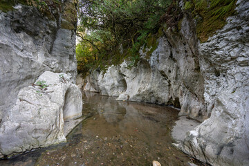 Cavernous rock formations in the shape of a gorge belonging to the source of the river Alviela