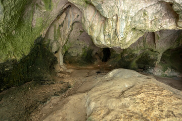 Cavernous rock formations in the shape of a gorge belonging to the source of the river Alviela where it is possible to watch the water