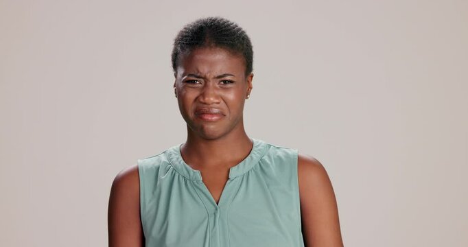 Face, gross and smell with black woman in studio on white background for reaction to revolting repellant. Gross, rotten or stinky and unhappy person in disagreement with with awful or nasty scent