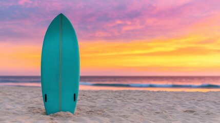 Turquoise Surfboard on Sandy Beach at Sunset