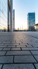 Fototapeta premium Modern urban landscape with reflective buildings and pavement