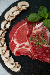 raw meat on a cutting board