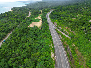 North South tool road highway St Catherine Kingston to Mammee Bay St Ann Ocho Rios Montego Bay North Coast Jamaica with lush greenery and Caribbean sea