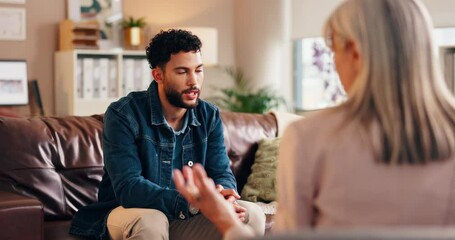 Therapist, man listening and patient with office discussion, advice and mental health check at consultation. Psychologist, counseling and sofa with conversation, meeting and professional care