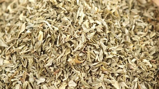 dried oregano on wooden background