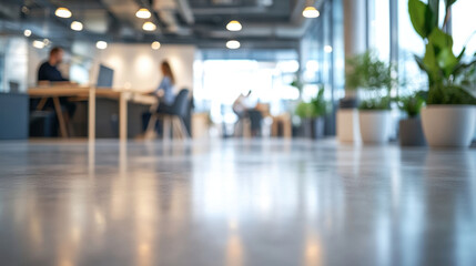 Fototapeta premium Modern office interior with blurred people working, showcasing vibrant workspace filled with plants and natural light, creating productive atmosphere