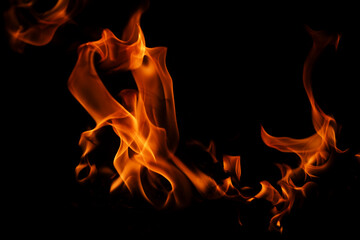 Obraz premium Flame of fire. Fire background. Fire flame texture. Blaze flames background for banner. Burning flames. Fire texture.