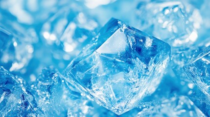 Close-up of shimmering ice cubes on a blue background