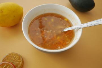 Enjoy a Delicious and Flavorful Bowl of Fresh Vegetable Soup with Citrus Fruits
