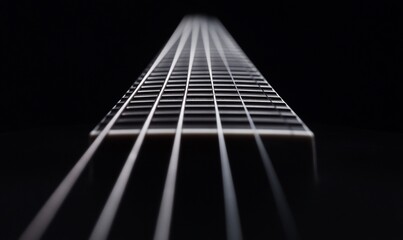 Close-up view of a guitar neck highlighting strings.