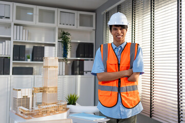 Portrait of Asian disabled businessman engineer working in the office. 