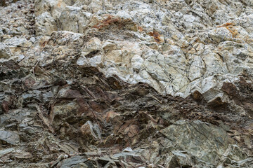 Angeles Crest Scenic Byway,  Los Angeles County, California. San Gabriel Mountains. GRANITIC ROCKS / igneous rocks. complexly intrusive as pods and dikes, some as aplite and pegmatite dikes