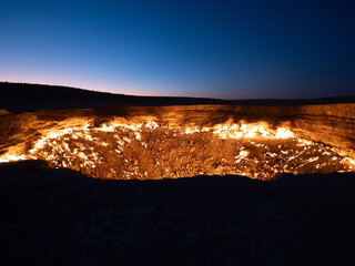 The Door to Hell Crater in the Karakum Desert in Turkmenistan at the Blue Hour