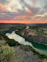 Snake River Canyon at sunset over the water in Twin Falls Idaho