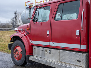 A fire truck for delivering firefighters to the fire site. The cabin of the fire truck. Equipment...