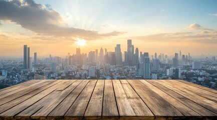 Wooden table overlooking city sunset.